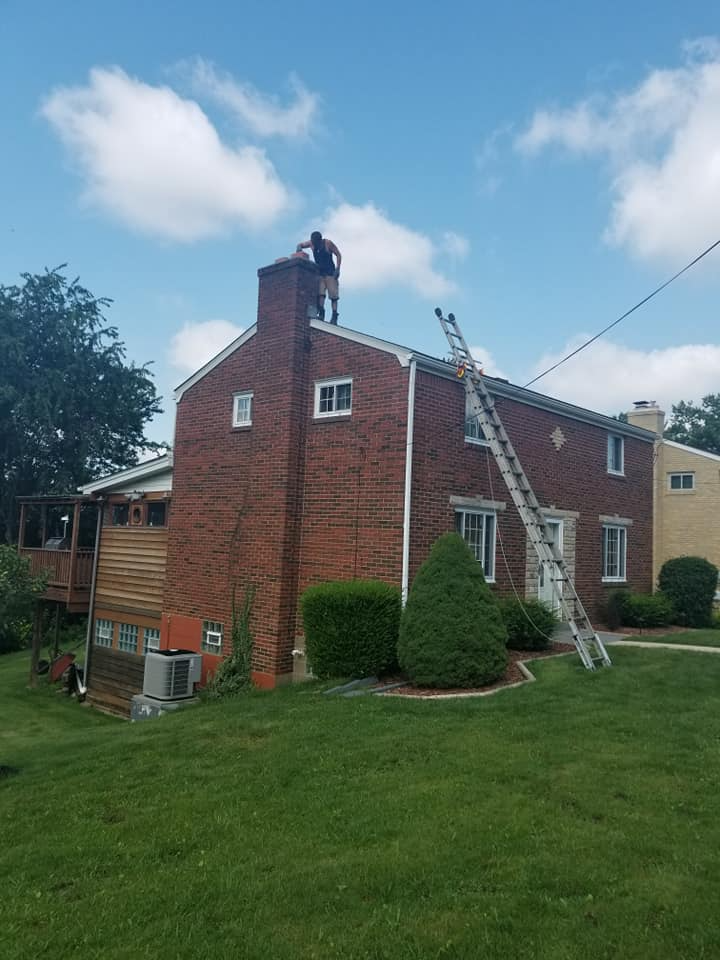 Chimney Restorer and ladder stabilisation when accessing roofs