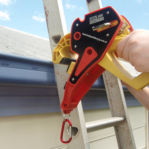 Close-up of Lock Jaw Ladder Grip securing a ladder for enhanced safety during roof access.