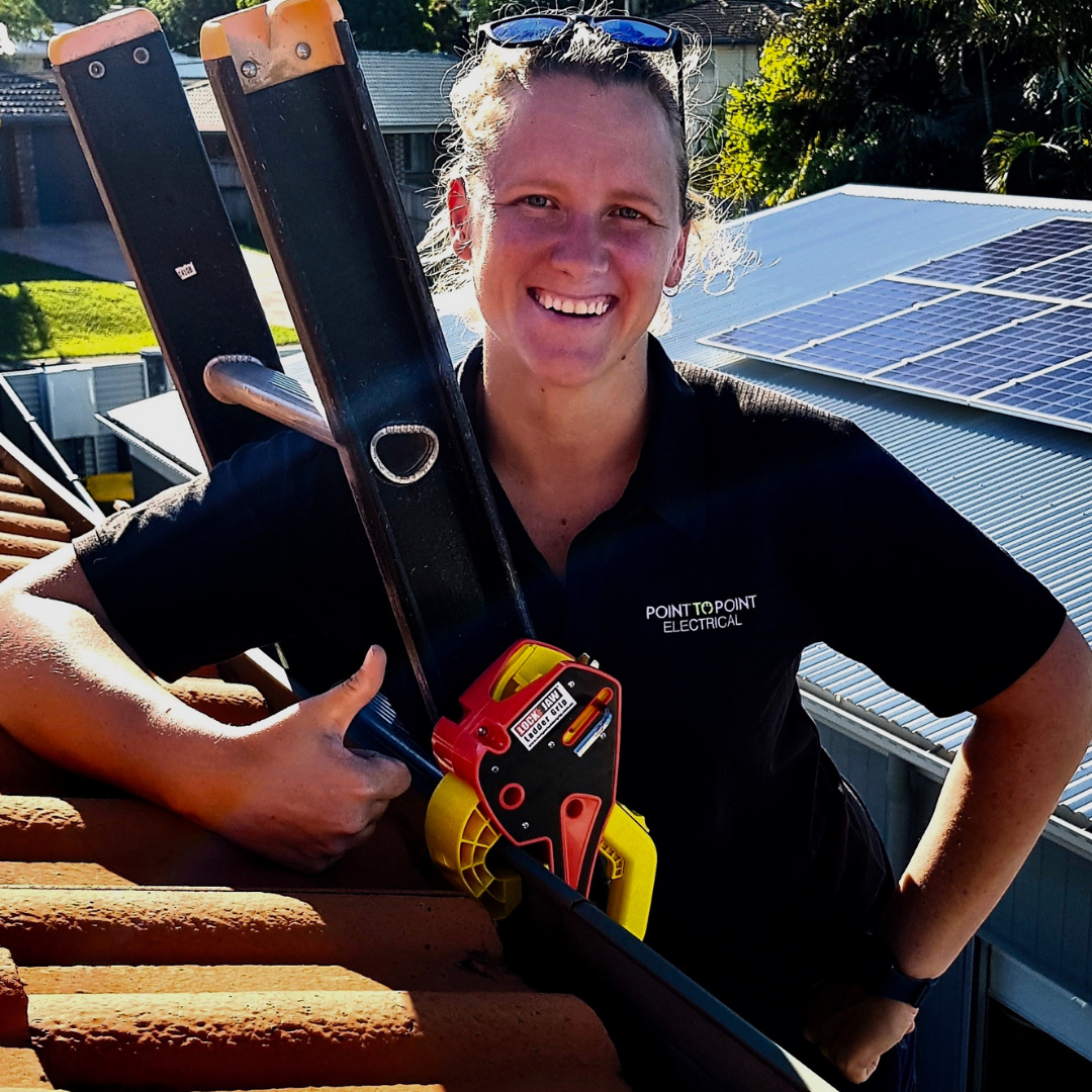 A woman accessing the roof using the best ladder stabilizer in Australia from Lock Jaw Ladder Grip